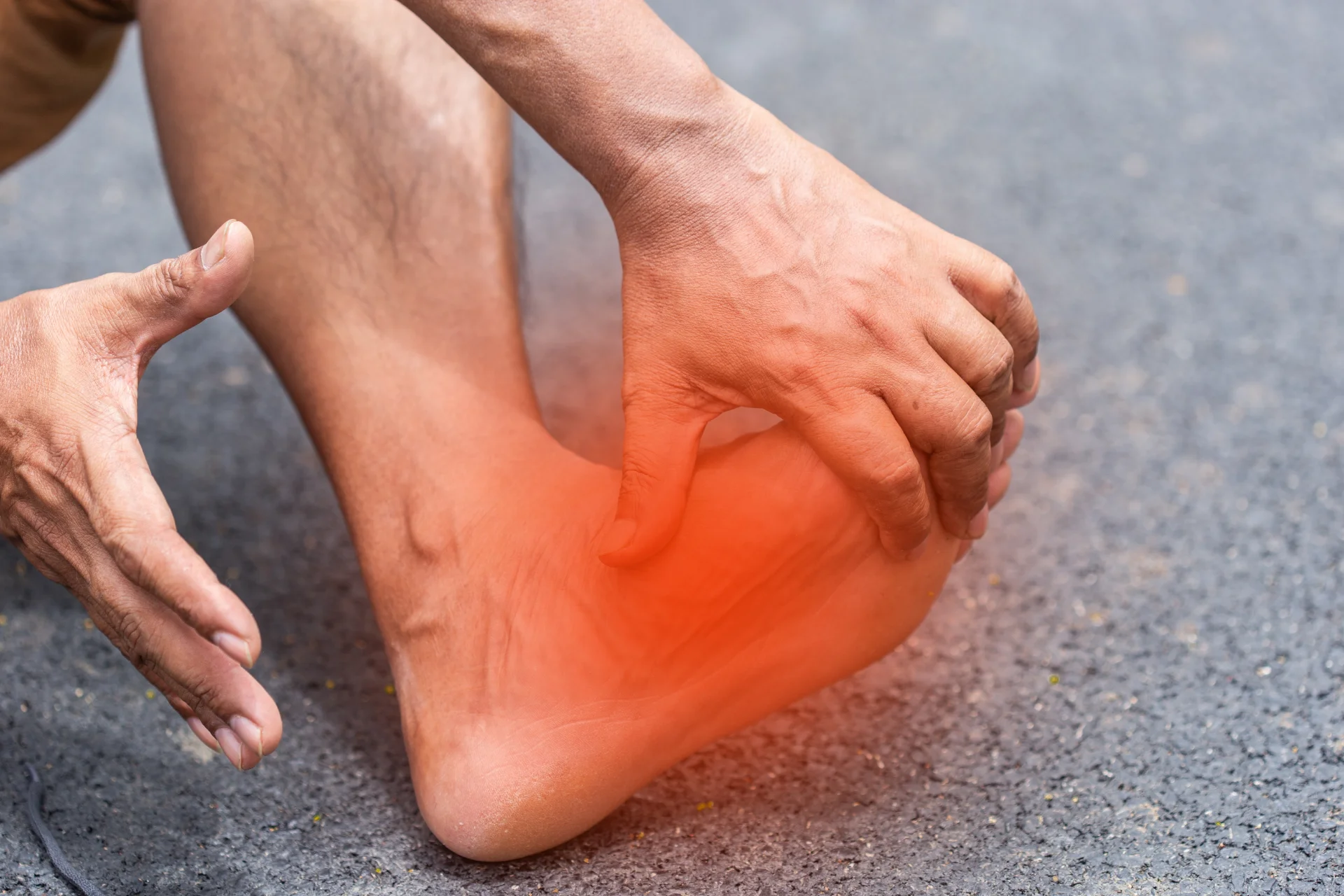 adult man holding foot with red highlight 2026 01 08 07 57 19 utc 1